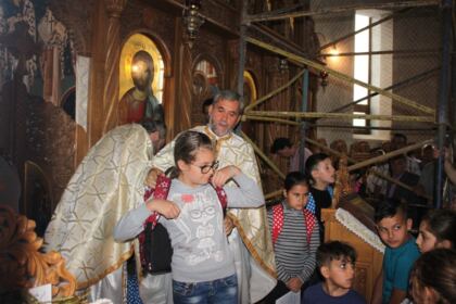 4000 de ghiozdane şi rechizite şcolare pentru copii defavorizaţi din Arhiepiscopia Dunării de Jos – fotografia 29