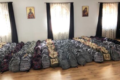 Ghiozdane şi rechizite şcolare pentru 4.000 de copii din Arhiepiscopia Dunării de Jos – fotografia 9