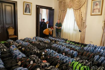 Arhiepiscopia Dunării de Jos continuă sprijinirea elevilor cu ghiozdane şi rechizite şcolare – fotografia 11